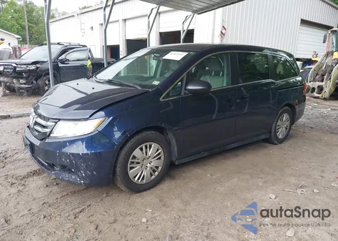 2014 Honda Odyssey Lx z USA, uszkodzony, nr VIN 5FNRL5H21EB082119